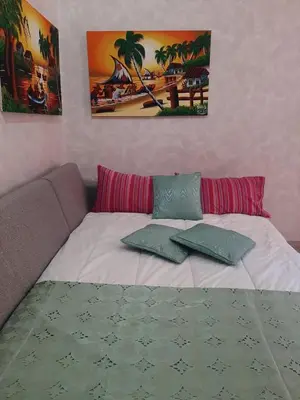 Letto o letti in una camera di Appartamento centro storico davanti al Duomo di Pavia