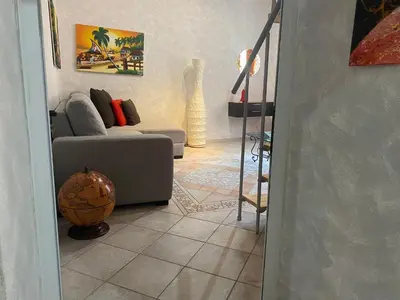 Area soggiorno di Appartamento centro storico davanti al Duomo di Pavia