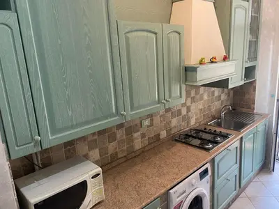 Cucina o angolo cottura di Appartamento centro storico davanti al Duomo di Pavia