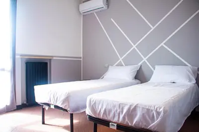 Letto o letti in una camera di Camere della Perla
