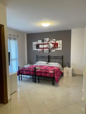 Letto o letti in una camera di Affitta Camere DA MARIA 1
