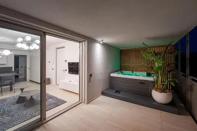 TV o dispositivi per l'intrattenimento presso Cremona Inn Aparthotel