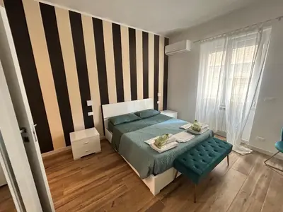 Letto o letti in una camera di Pop House