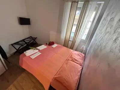 Letto o letti in una camera di Pop House