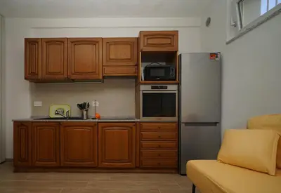 Cucina o angolo cottura di Casa Carlotta - mytouristhome