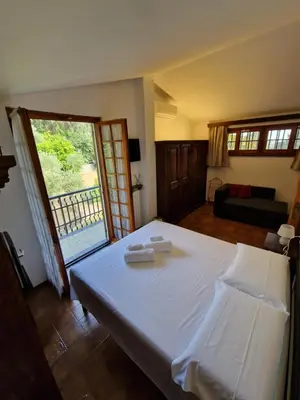 Letto o letti in una camera di Villa Angelica
