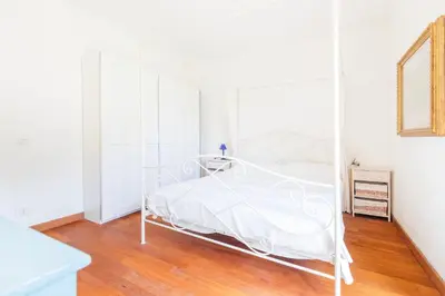 Letto o letti in una camera di Casa Marchelli