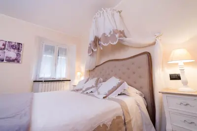 Letto o letti in una camera di Il Sogno Maison de Charme