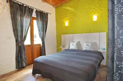 Letto o letti in una camera di Agriturismo OlivArancio