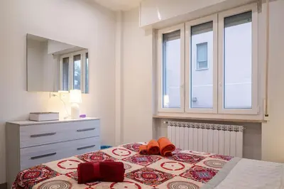 Letto o letti in una camera di Appartamento Lussuoso