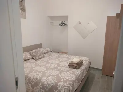 Letto o letti in una camera di Casa Colomba