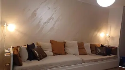Letto o letti in una camera di Appartamento 93 di andrea sonzogni