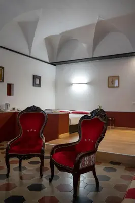 Area soggiorno di Parma, Antico Studio dietro al Battistero