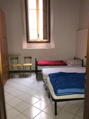 Letto o letti in una camera di Volturno Palace