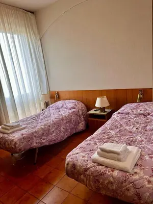 Letto o letti in una camera di Hotel Business