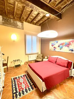 Letto o letti in una camera di B&B L'Argonauta