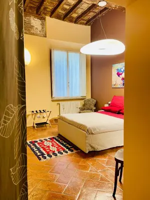 Letto o letti in una camera di B&B L'Argonauta