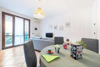 Area soggiorno di GuestHost - Casa Emilia - cozy apartment in Parma