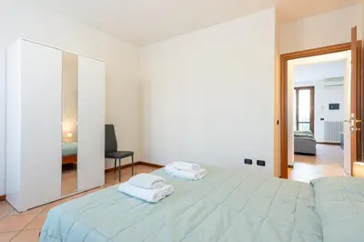 Letto o letti in una camera di GuestHost - Casa Emilia - cozy apartment in Parma