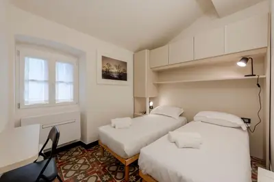 Letto o letti in una camera di JOIVY Bright 2BR flat, moments from the beach