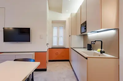 Cucina o angolo cottura di JOIVY Bright 2BR flat, moments from the beach