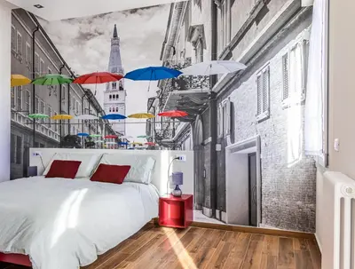 Letto o letti in una camera di Room77 Modena