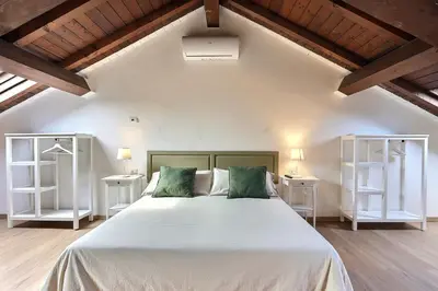Letto o letti in una camera di Residence il Cascinetto