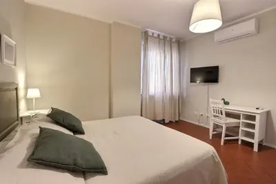 Letto o letti in una camera di Residence il Cascinetto