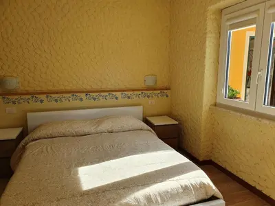 Letto o letti in una camera di Agriturismo Costa di Campo