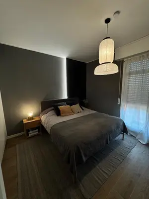 Letto o letti in una camera di Appartamenti a Carpi