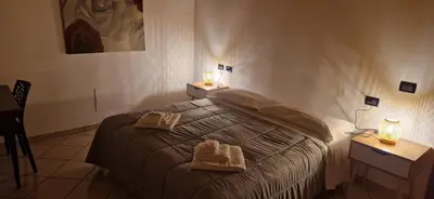 Letto o letti in una camera di Hotel IL Rifugio