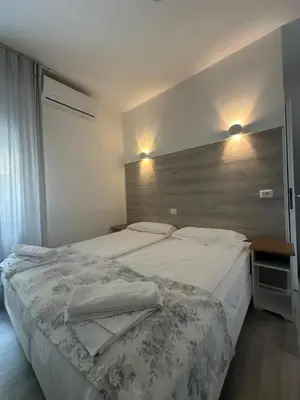 Letto o letti in una camera di Albergo del Pozzo