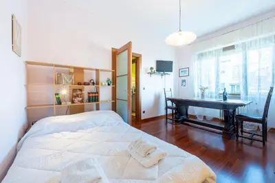 Letto o letti in una camera di GuestHost - Parma Cozy Studio near the Hospital