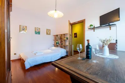 Letto o letti in una camera di GuestHost - Parma Cozy Studio near the Hospital