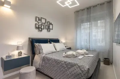 Letto o letti in una camera di Palazzo Cavour, 34 - Luxury Suite Decumano