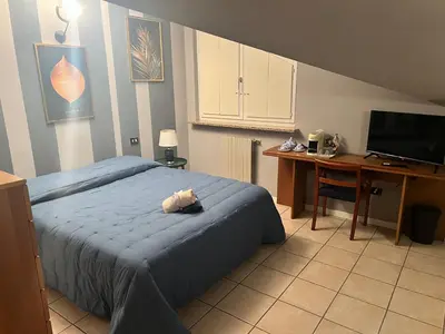 Letto o letti in una camera di B&B A Casa Mia
