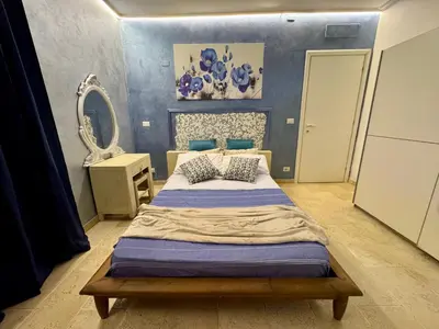 Letto o letti in una camera di Villa San Cataldo primo piano
