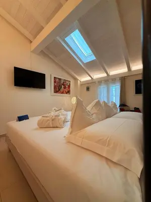 Letto o letti in una camera di ROOMS,REGGIO AFFITTACAMERE con Bagno Privato, TV, Clima , Wi-Fi