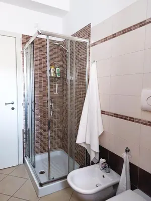 Bagno di CasaOlivier appartamento con giardino e biciclette