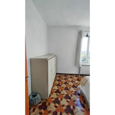 Letto o letti in una camera di Affittacamere Les chambres