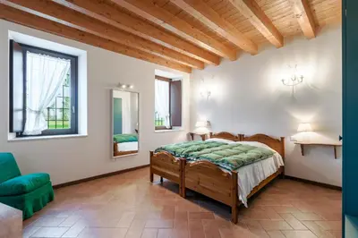 Letto o letti in una camera di Agriturismo Cascina Tavolette
