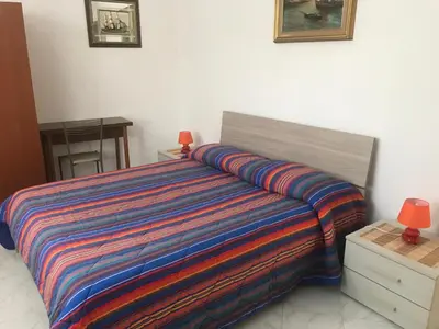 Letto o letti in una camera di Villa Santanna