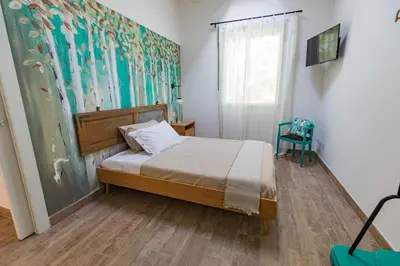 Letto o letti in una camera di Saranto, Maison du charme - Nel cuore verde dell'Emilia