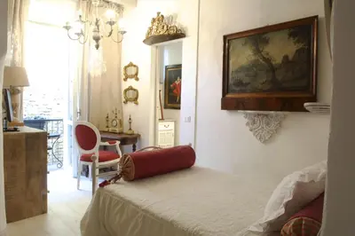 Letto o letti in una camera di Le Stanze del Cardinale
