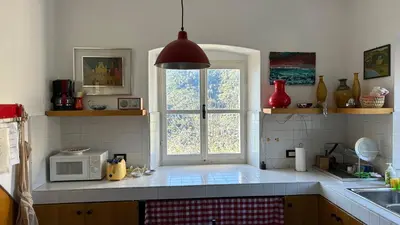 Cucina o angolo cottura di Historical Villa The Birdhouse - Garden Views