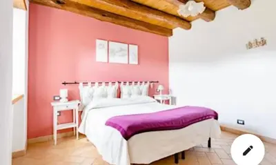 Letto o letti in una camera di Agriturismo Angiò nel Cerè