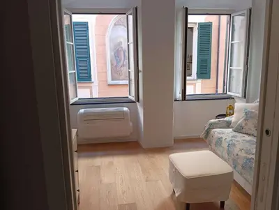 Letto o letti in una camera di The Fisherman's house Rapallo centro storico