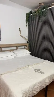 Letto o letti in una camera di Hotel Marina