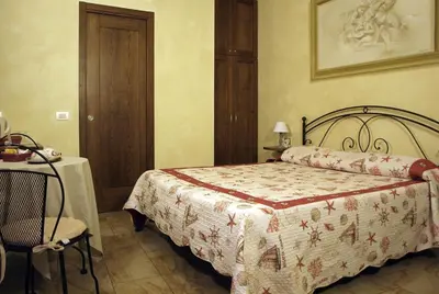Letto o letti in una camera di Pietre di Mare