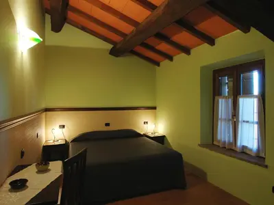 Letto o letti in una camera di Antica Grancia Benedettina